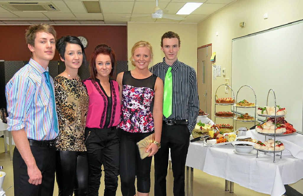 Charlie Parker, Danielle Logan, Joshua Sharman, Sarah Fenton and Shaunena Duffy serve delicious food. Charlie Parker, Danielle Logan, Joshua Sharman, Sarah Fenton and Shaunena Duffy serve delicious food.